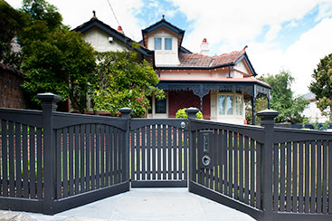 Picket and handrail fence with arched valence